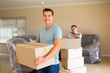 © michaeljung - young couple moving in to new home