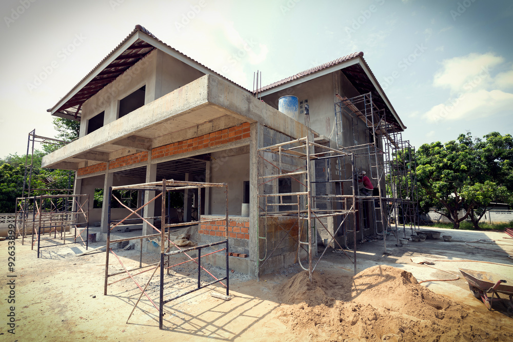 building residential construction house with scaffold steel - obrazy, fototapety, plakaty 