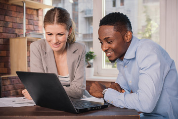 Two business people working together