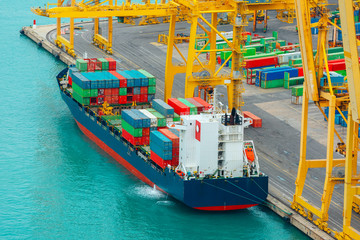 Loading containers on a sea cargo ship, Barcelona