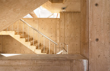 Modern Concrete Stairwell In Warm Light