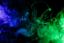 Abstract Blue And Green Smoke Hookah On A Black Background.