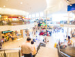 © themorningglory - Blurred image of people shopping at mall of home decor