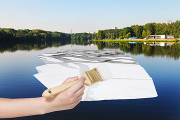 Canvas Print - paintbrush paints ice floe in summer lake