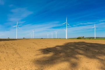 Plowed fields and wind farm