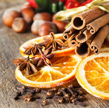 Cinnamon Sticks, Cloves, Anise Stars And Slices Of Dried Citrus