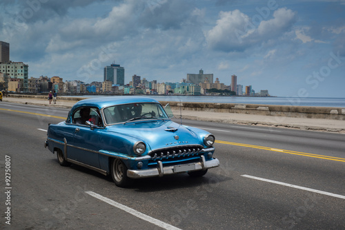 Naklejka na drzwi Classic american car drive on street in Havana,Cuba