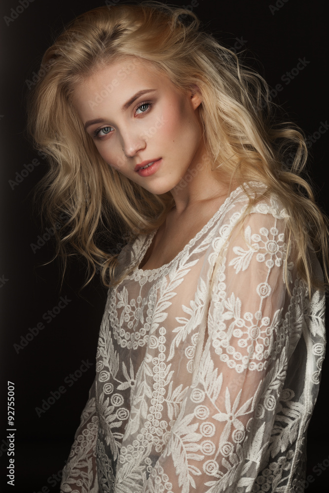 Fotografering Studio portrait of a beautiful young blond woman