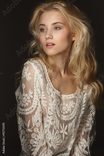 Fotografering Studio portrait of a beautiful young blond woman