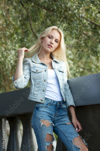 Fotografering Beautiful young blond girl outdoors