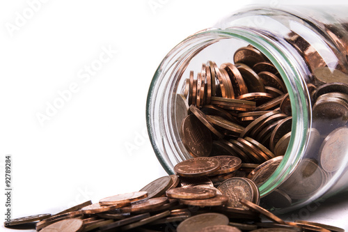 Cuadros en Lienzo British Penny Coins Spilling From A jar