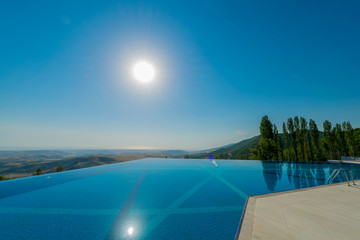 Poster - Infinity pool on the bright summer day