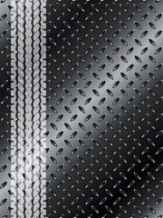 Industrial background with truck tyre on black metallic mesh