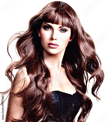 Naklejka dekoracyjna Beautiful young woman with long brown hair.