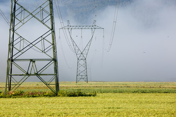 Big electricity high voltage pylon with power lines