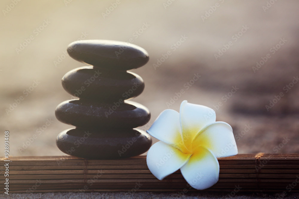 Spa stones with flower outdoors