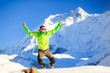 © blas - Man hiker accomplish happy jump in winter mountains Himalayas, Nepal