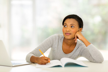 Wall Mural - thoughtful young woman studying