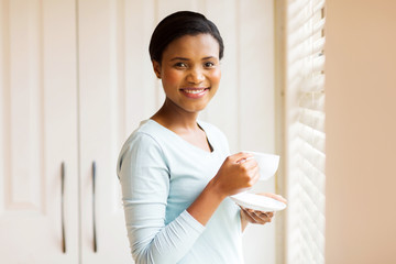 Wall Mural - afro american woman drinking tea