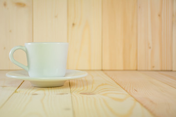 Coffee cup on wood table