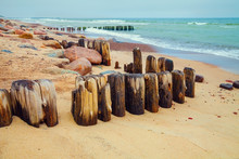 Desert Beach With Old Wooden Column