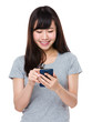 © leungchopan - Asian Woman use of the cellphone