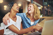 © Flamingo Images - Two affectionate multiracial women friends