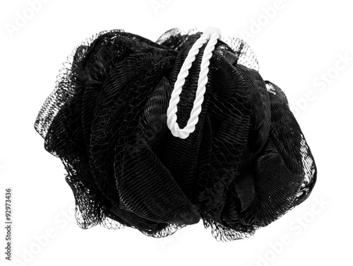 Fotografie, Obraz Exfoliating black mesh sponge on a white background
