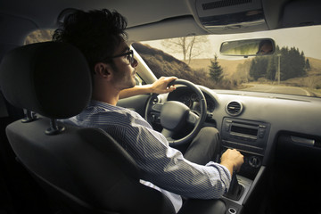 Wall Mural - Man driving a car