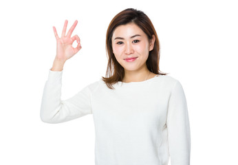 Wall Mural - Woman showing ok sign gesture