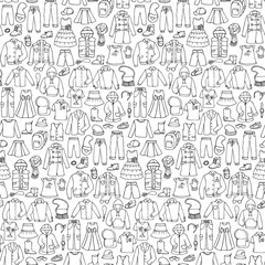 Wall Mural - Seamless hand drawn doodle pattern with childish clothes