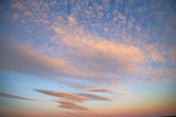Fototapeta Na sufit - sunrise in the colored sky white soft clouds and abstract backgr
