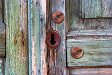 Old Wooden Door And Rusty Keyhole In Astrakhan, Russia
