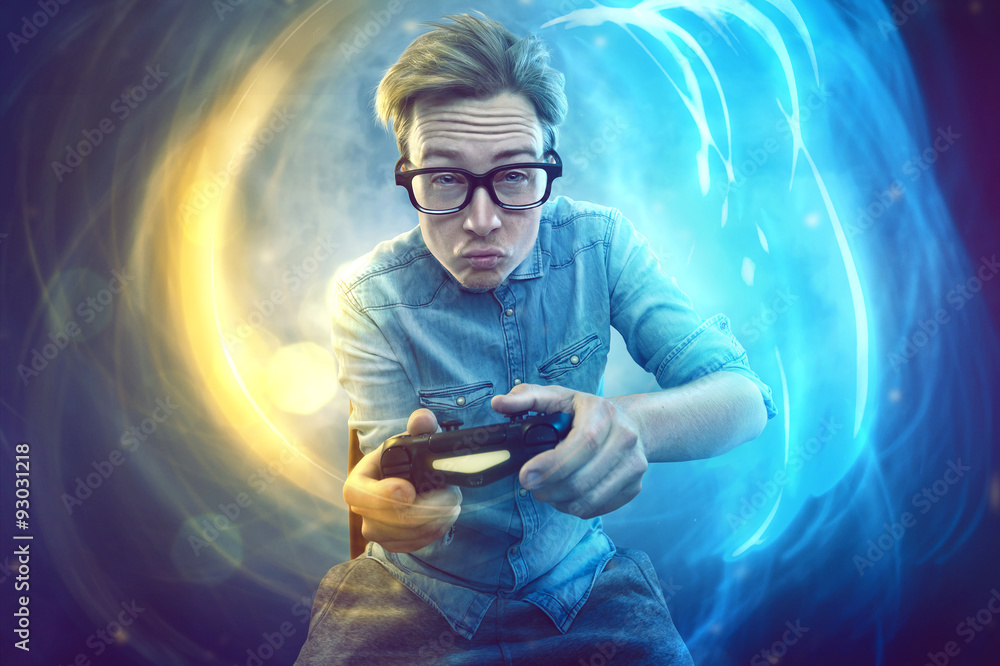 Nerdy gamer with controller - obrazy, fototapety, plakaty 