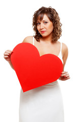 Poster - Young woman holding red paper heart