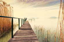 Wooden Pier In Tranquil Lake Balaton