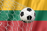 Fototapeta Sport - Lithuania flag and soccer ball, football in goal net