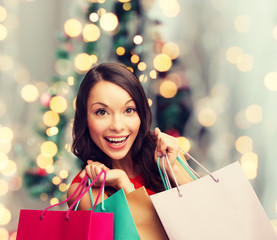 Sticker - smiling woman with colorful shopping bags