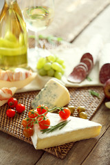 Fototapete - Still life with various types of Italian food and wine