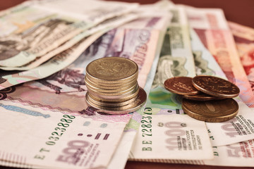 Russian rubles coins on brown background