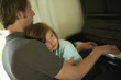 © Westend61 - Father playing piano with daughter on his lap