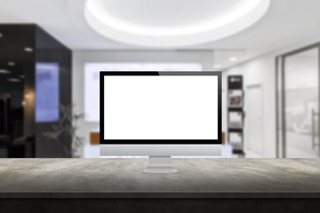 Wall Mural - computer monitor on the desk office interior in the background display mock up
