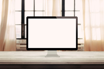 Poster - computer display on desk et home office interior with windows in the background mock up presentation