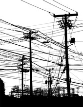 A Complex Maze Of Telephone Poles And Wires