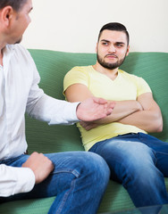 Wall Mural - Male adults arguing about something