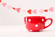 Big Red Coffee Mug And Hearts Garland