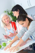 © auremar - Three generations of women baking together