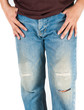 Jeans torn at the knees on white background.
