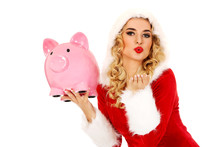 Santa Woman Holding A Piggy Bank And Sending A Kiss