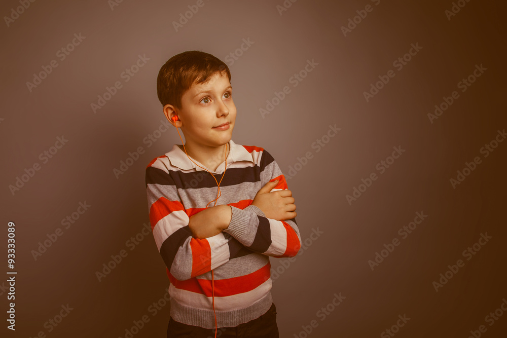r boy of about ten European appearance Brown listens vacuum head Stock ...